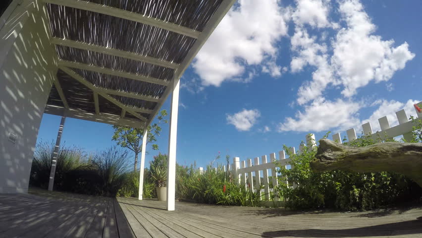 Time Lapse of Deck with Beautiful Sky and Clouds