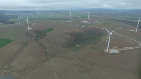 Aerial View Flying Across Wind Farm