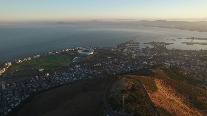 Aerial Panning Shot Over Cape Town City at Sunrise