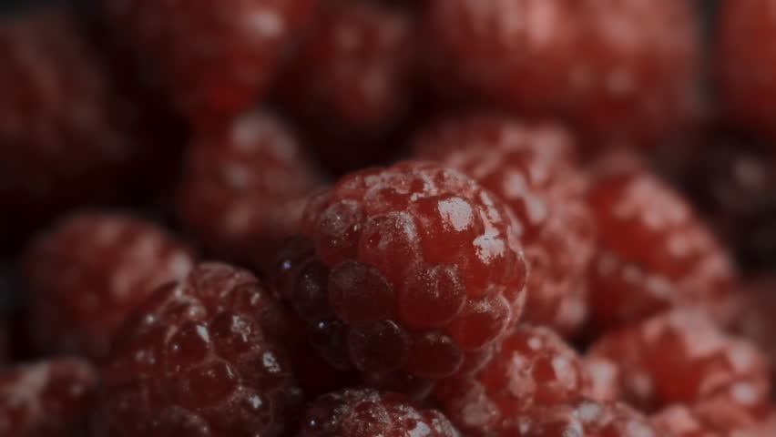 dessert of raspberries and ice cream close up