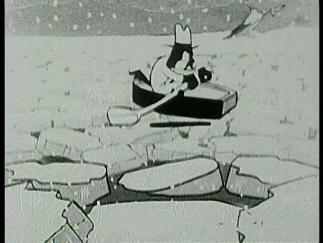 Animal paddling row boat over ice