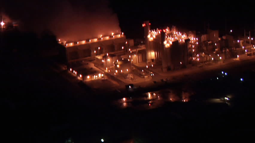 An overview shot of a factory at night.