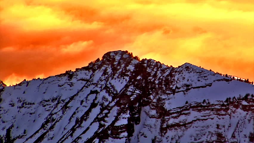 A beautiful mountain peak shot during sunset on a cold winter day.