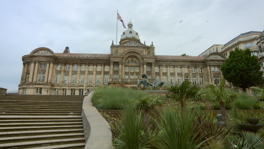 Birmingham, England - Victoria Square early morning. Wide shot of the west steps leading up to the Council House with the planted River area. 4K UHD