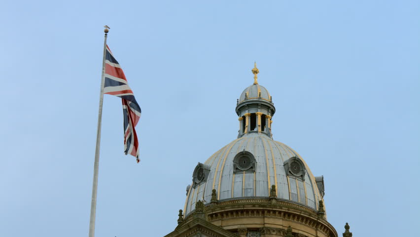 Birmingham, England - Victoria Square early morning.  Council Hall dome and Union Jack flag. 4K UHD