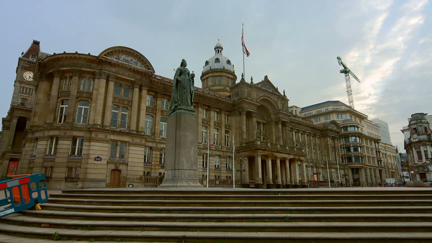 Birmingham, England - Victoria Square early morning. Wide pan of the square from the west near the statue of Queen Victoria. 4K UHD