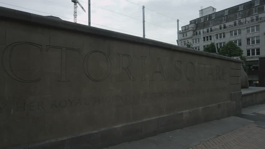 Birmingham, England - Victoria Square early morning. The wall with the name of the square. Pans left. 4K UHD.