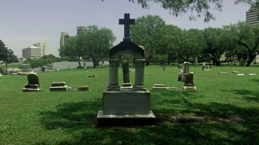 HD view of a cemetery dated back to the late eighteen hundreds in broad daylight