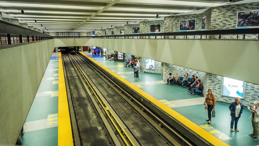 Time lapse view of trains arriving and departing from subway station in Montreal, Quebec, Canada. 