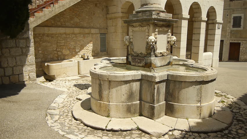 Old fountain at little village in Pre Alpes in South France