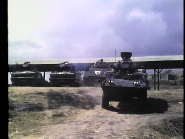 Military  tanks leaving base