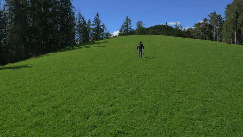 Aerial view of male hiker walking Dolomites Italy