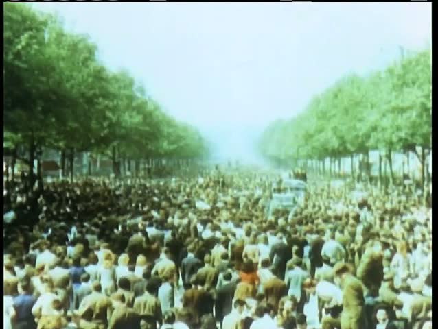 Crowd celebrating liberation on the Champs Elysees at the end of World War II