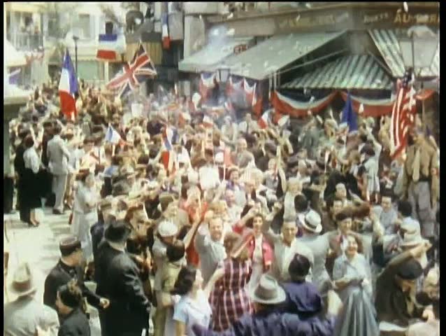 Crowd celebrating liberation in the streets at the end of World War II