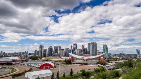 CALGARY, CANADA - JULY 23: Time-lapse of the Calgary skyline on July 23, 2014 in Calgary, Alberta. This vantage point is from Scotsman's Hill above the stampede grounds. 