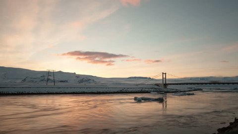 4K Time lapse zoom in of icebergs moving in the Glacier Lagoon Jokulsarlon in Iceland at sunset
