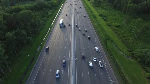 Aerial View of Traffic on a Motorway Ring Road Through a Wooded Area in Moscow City, Russia