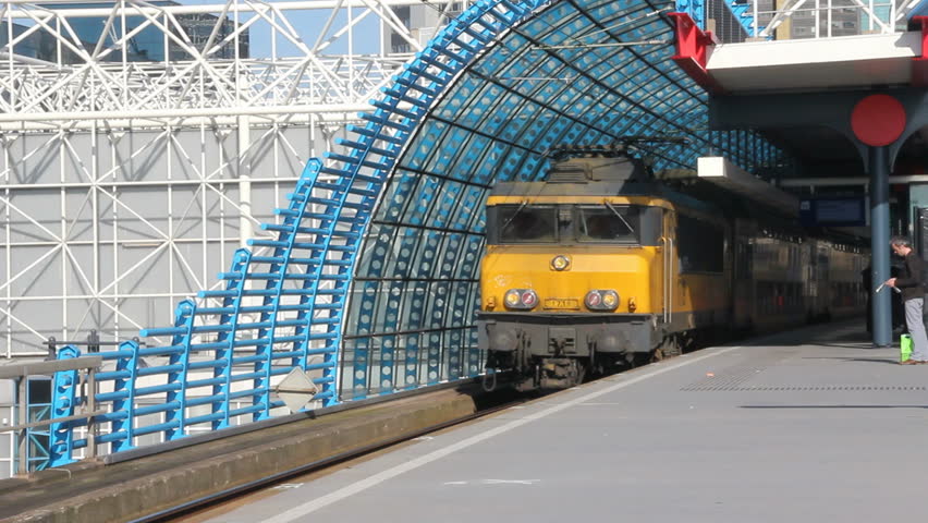 Passenger train leaves Amsterdam Sloterdijk station on August 1, 2011 in Amsterdam, Holland.