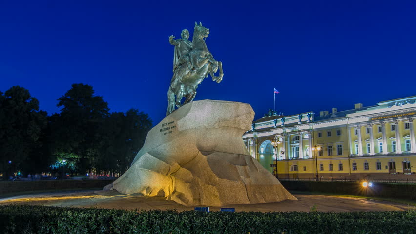 Peter the Great monument (Bronze Horseman) on the Senate Square night timelapse hyperlapse. Tourists walking around at summer white night. ST PETERSBURG, RUSSIA