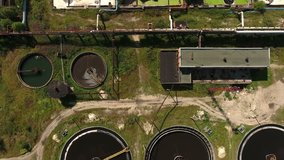 Aerial video of water treatment plant with circles clarifiers 
