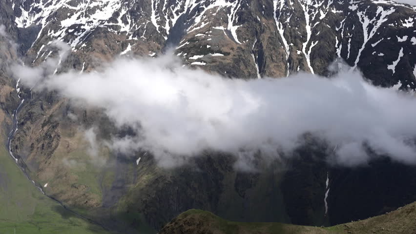 Summer Landscape in the Mountains  Clouds Flying Between Rocks