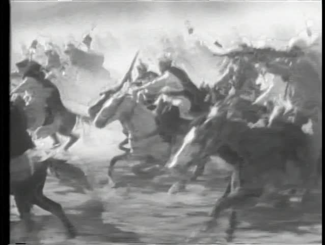 Moroccan cavalry charging through desert