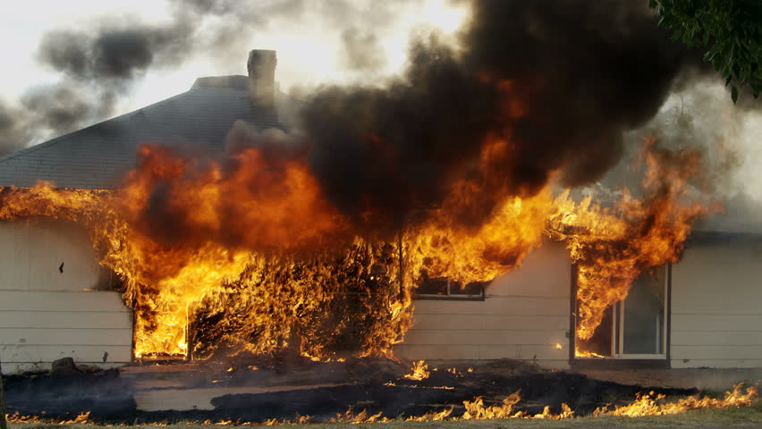 House on fire burning during a controlled burn in Idaho. Royalty-Free Stock Footage #18350995
