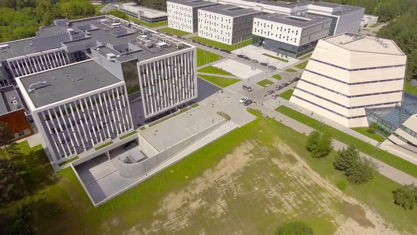 Aerial establishing shot complex of modern buildings, my represent company headquarters, bank, institute, university, research center etc.