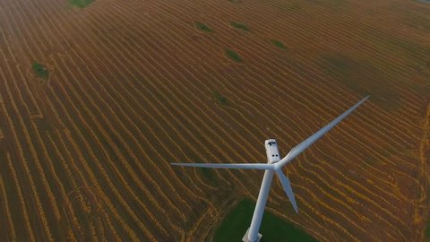 Aerial View. Beautiful windmill turbines , wind energy turbines . Aerial drone shot. 4K 30fps 