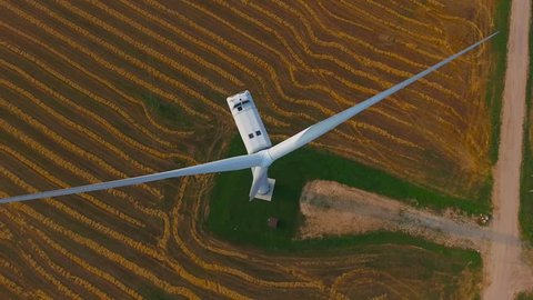 Aerial View. Beautiful windmill turbines , wind energy turbines . Aerial drone shot. 4K 30fps 