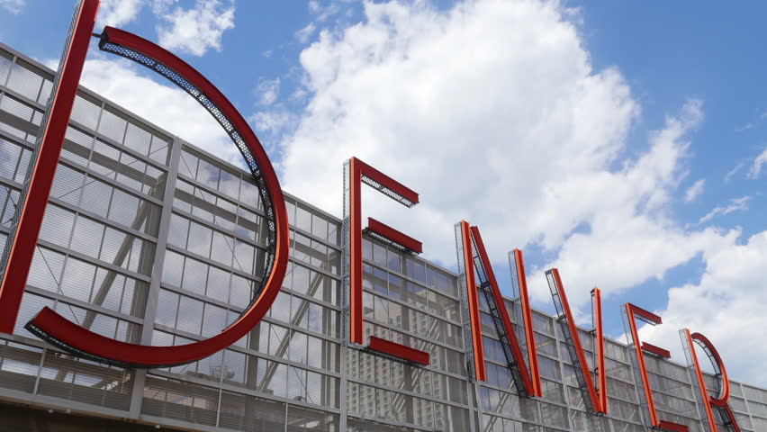 Denver, CO - July 16, 2016: A large Denver sign on the top of the Denver Pavilions shopping center in downtown Denver on a sunny summer day. Denver enjoys a beautiful climate with plentiful sunshine.