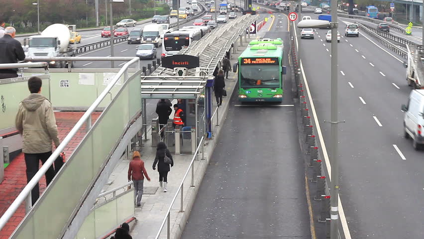 ISTANBUL - DECEMBER 16: Incirli bus stop with green Metrobus on December 16,