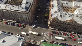 St. Petersburg day road traffic on narrow old street. Russia from above. Drone footage. 4k video.