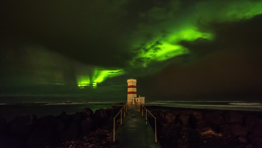 Aurora Borealis / Northern Lights above Gardur  Lighthouse near Reykjavik, Iceland 