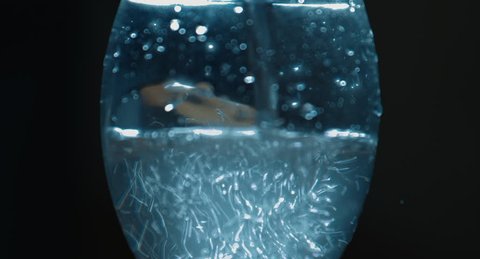 4K shot of clean water pour to glass.