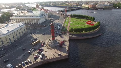 Aerial cinematic view of st. Petersburg city. Neva river panorama. Rostral Columns in St. Petersburg, Russia. Quadcopter drone unique high altitude flight over city. 4K footage.