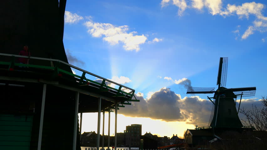 View of windmills in Zaanse Schans, Netherlands, at twilight