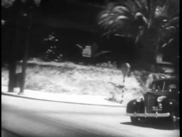 Police car chasing vehicle on street