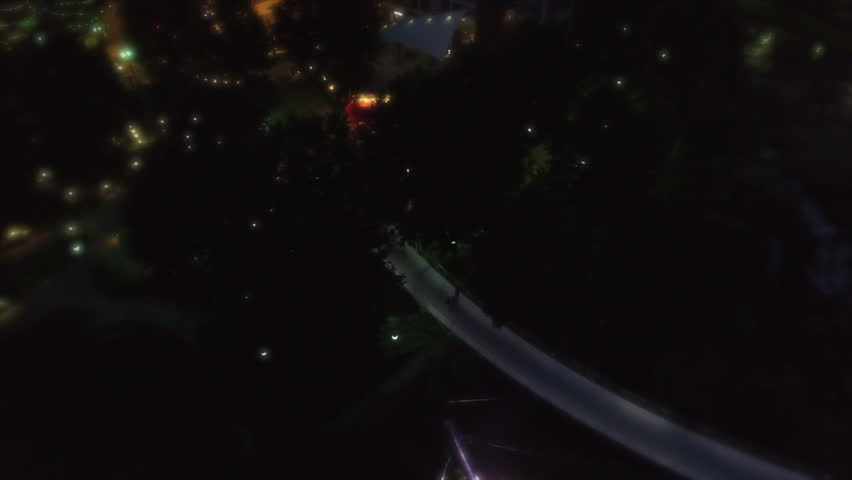 Night aerial flying over Greenville South Carolina. Flying over upstate South Carolina city of Greenville SC at night. Night over urban American city.