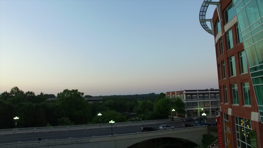 Night aerial flying over Greenville South Carolina. Flying over upstate South Carolina city of Greenville SC at night. Night over urban American city.
