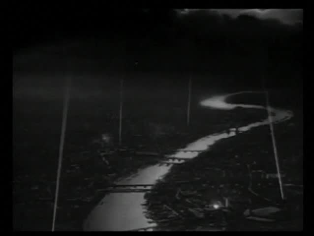 Historical reenactment World War I missiles dropping from sky at night
