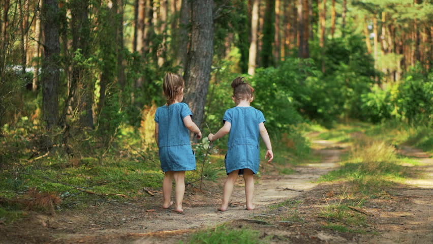 girl walking in the woods