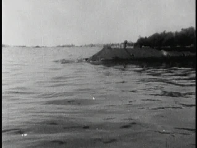 Submarine emitting black smoke