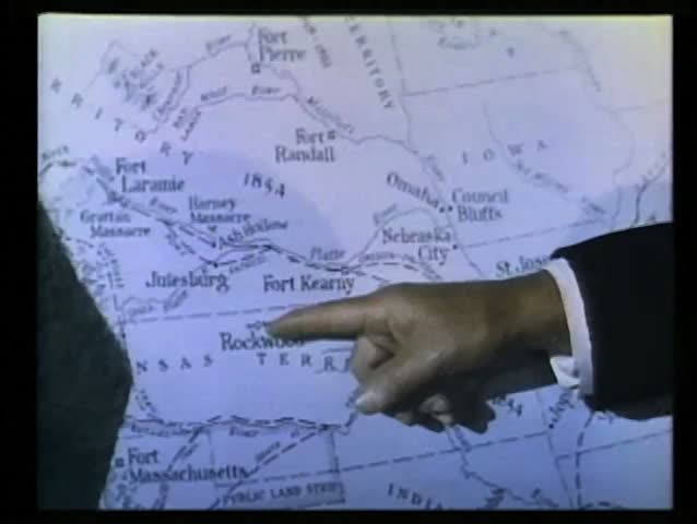 Close-up of hand pointing to 1854 map