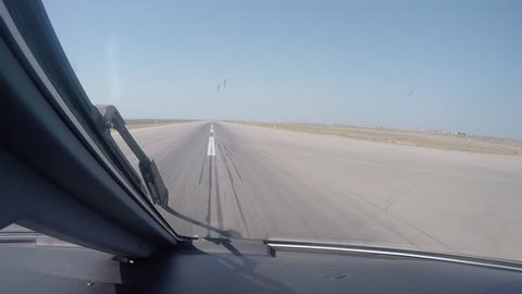 The 4K footage of Aircrafts cockpit view making an approach and landing at the airport.