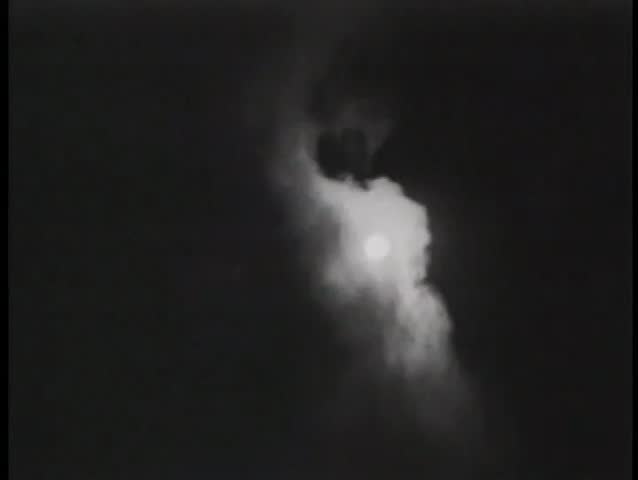 Moon in cloudy sky