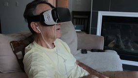 Smooth Dolly Slider Shot Of Senior Man Experiencing Mobile Virtual Reality - 360 Movie Video 3D Amazing New Technology