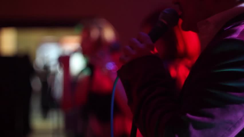Man singing at the microphone 