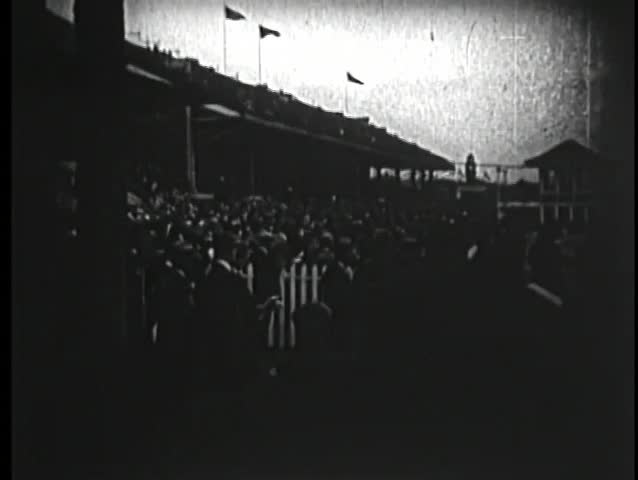 Wide shot of crowd at race track