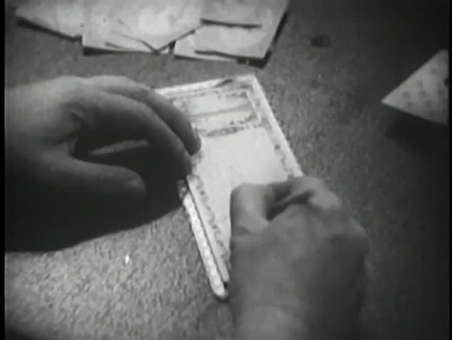 Close-up of hand writing a note